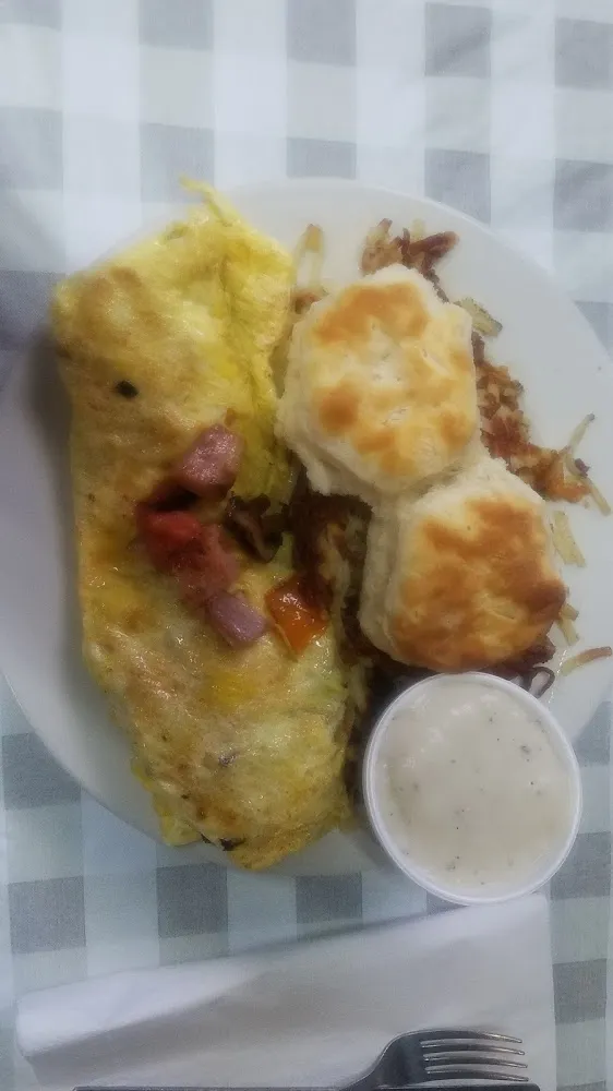 Omelette with Everything Hash Browns Biscuits and Gravy